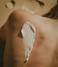 Eufora Aloetherapy Mineral Sunscreen cream applied to a shoulder